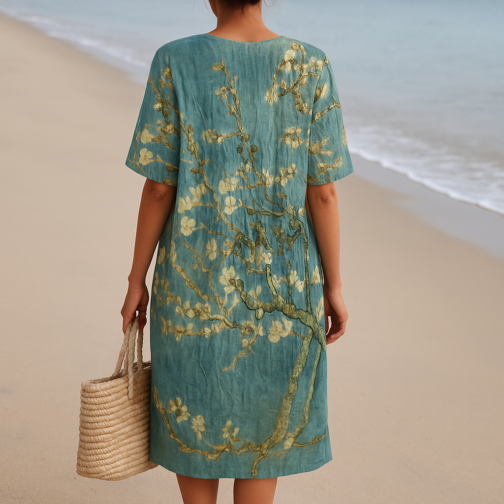 ALMONDE | Blauw-groene jurk met bloemenprint